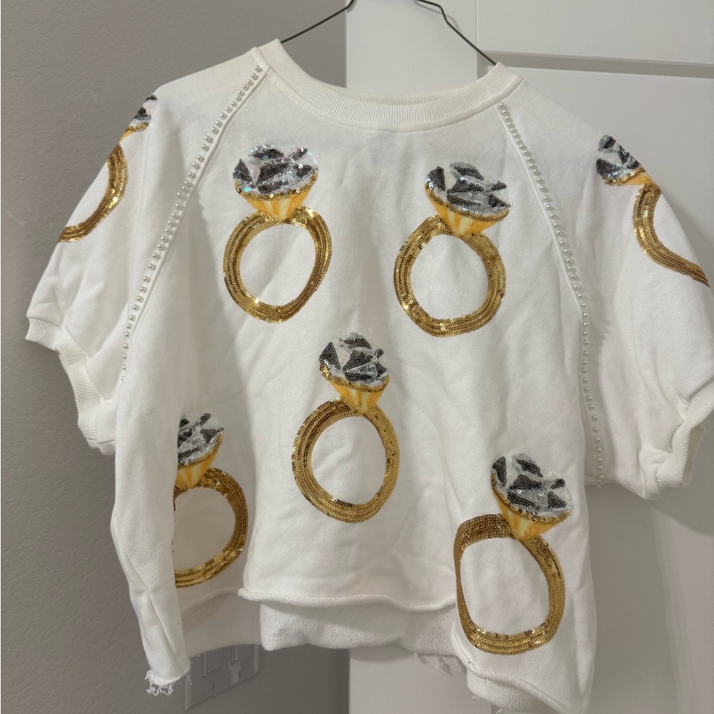 White Sweater with Gold engagement Ring Sequin and Pearl Design